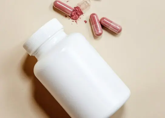 Blank label bottle with pills