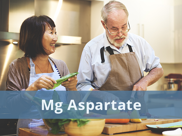 an old couple cooking with Mg Aspartate
