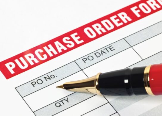 Image of purchase order form and pen