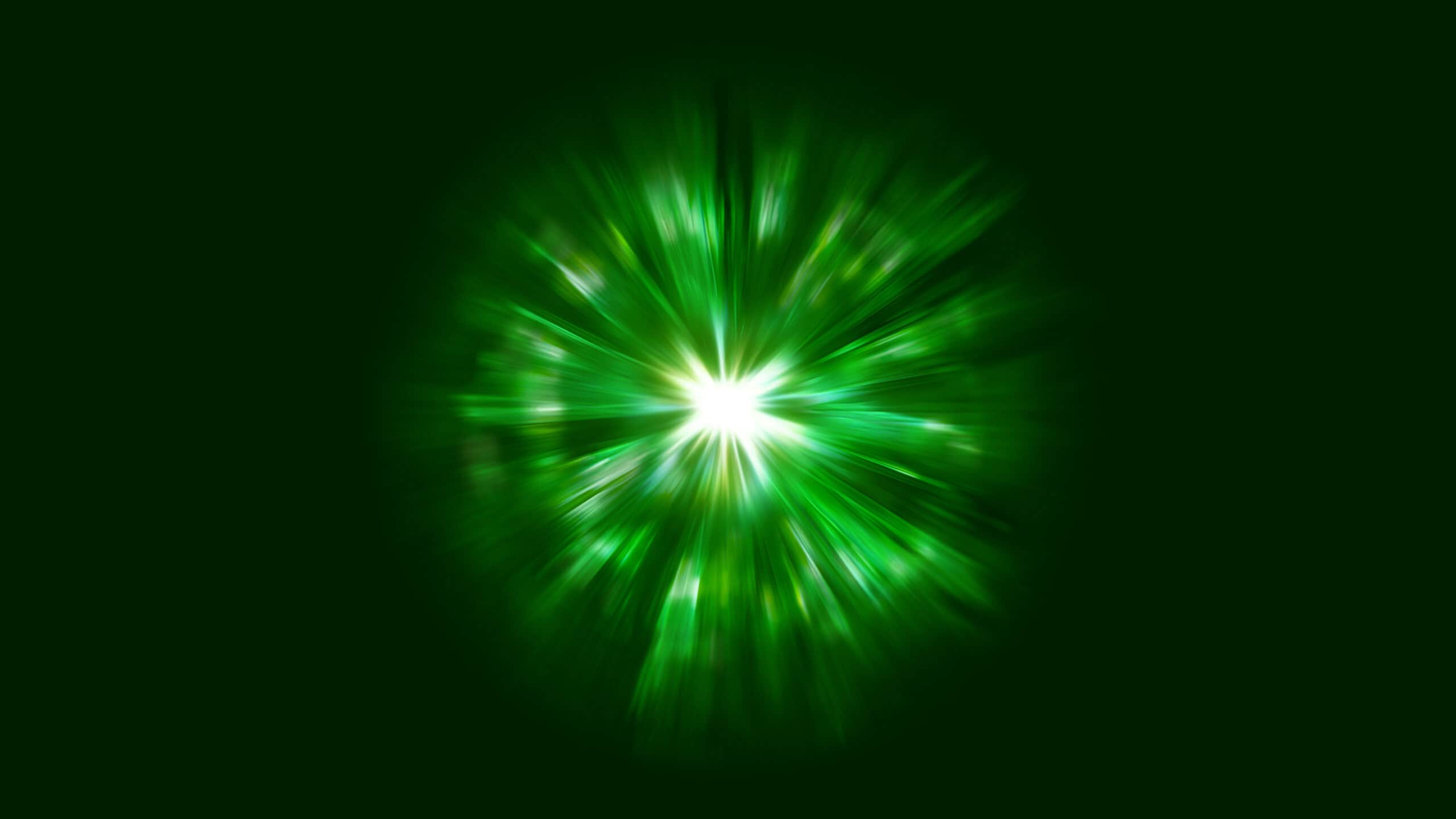 Keyvisual_Balchem_K2Vital_4K_16.9_sRGB_V01 Green burst of light with bright streaks in dark.