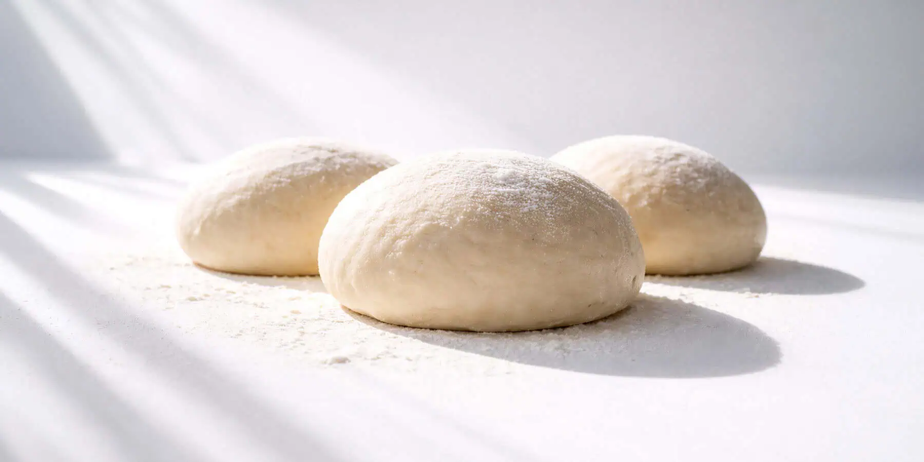 image of three loaves of dough