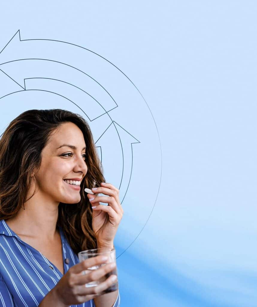 Image of a woman taking a pill