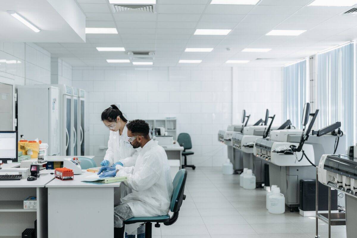 Pexels Pavel Danilyuk 8442265 Scientists working in a lab with equipment.