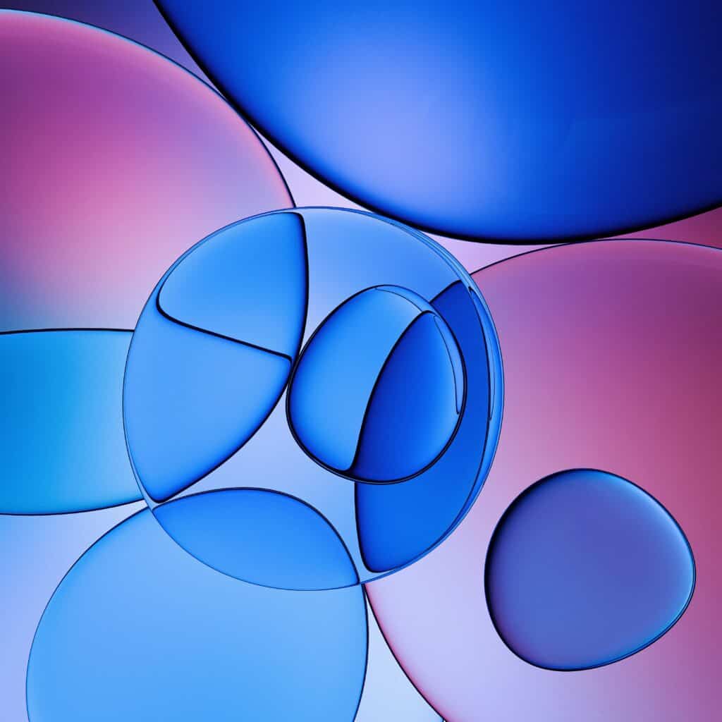 Shubham Dhage DxXnmHawU1g Unsplash Abstract circles in blue, pink, and purple layers.
