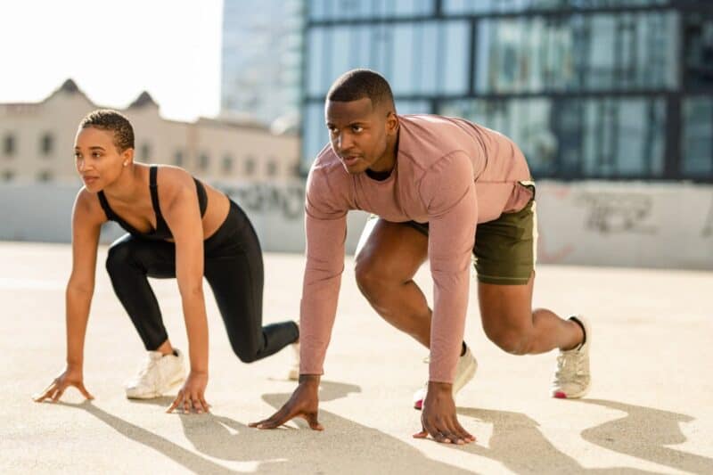 Couple getting ready to run.