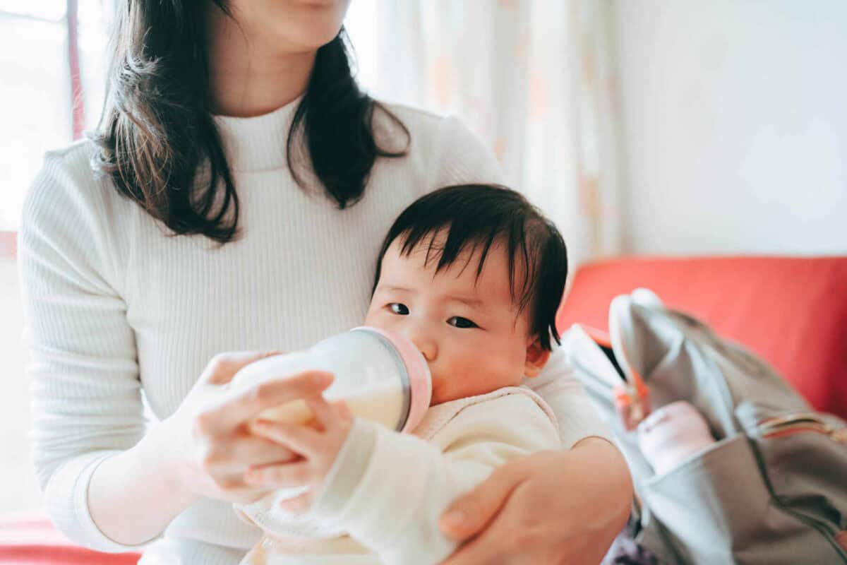 Prenatal mom feeding baby