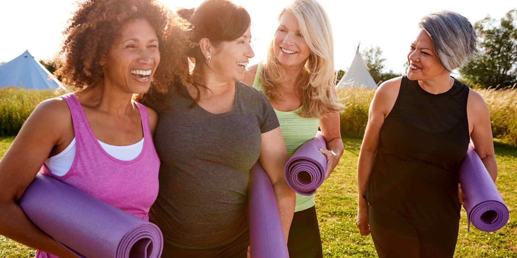 mid-aged women going to a yoga class