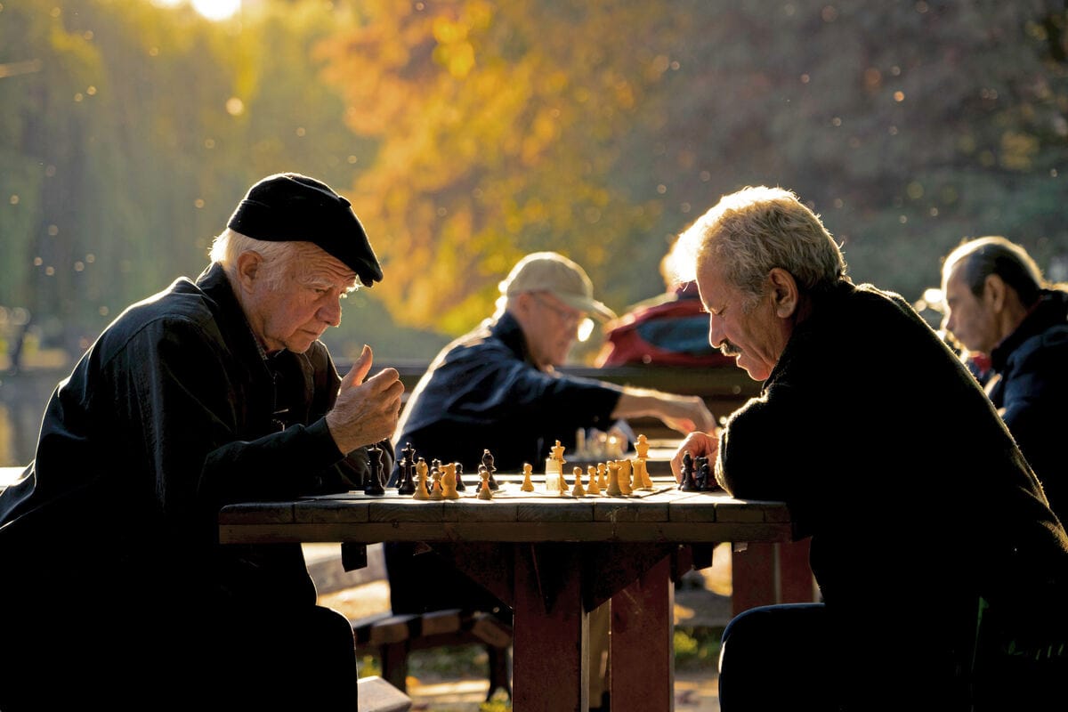 Val Vesa P0F ZH39qhs Unsplash Ret (1) elderly men playing chess in a park