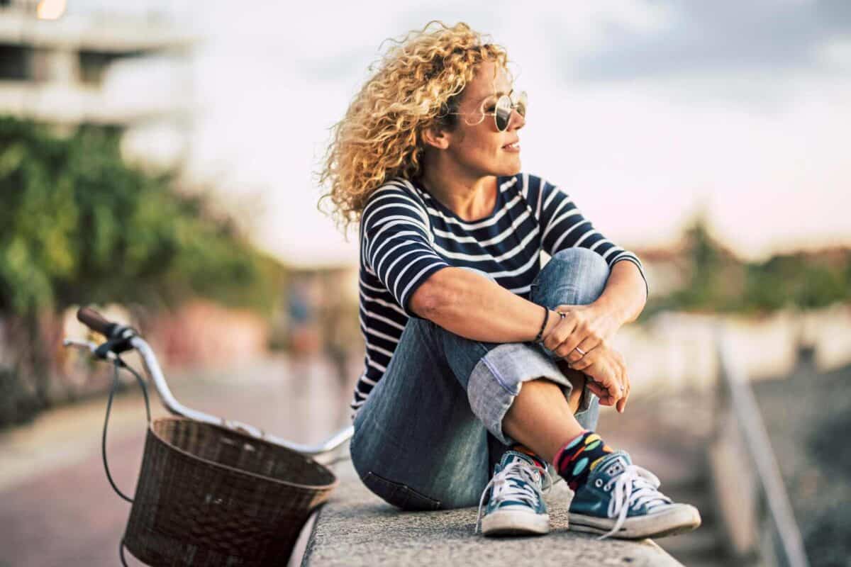 Image of a woman sitting on the water