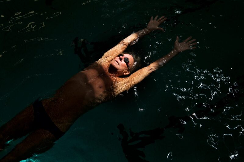 Image of an older man swimming