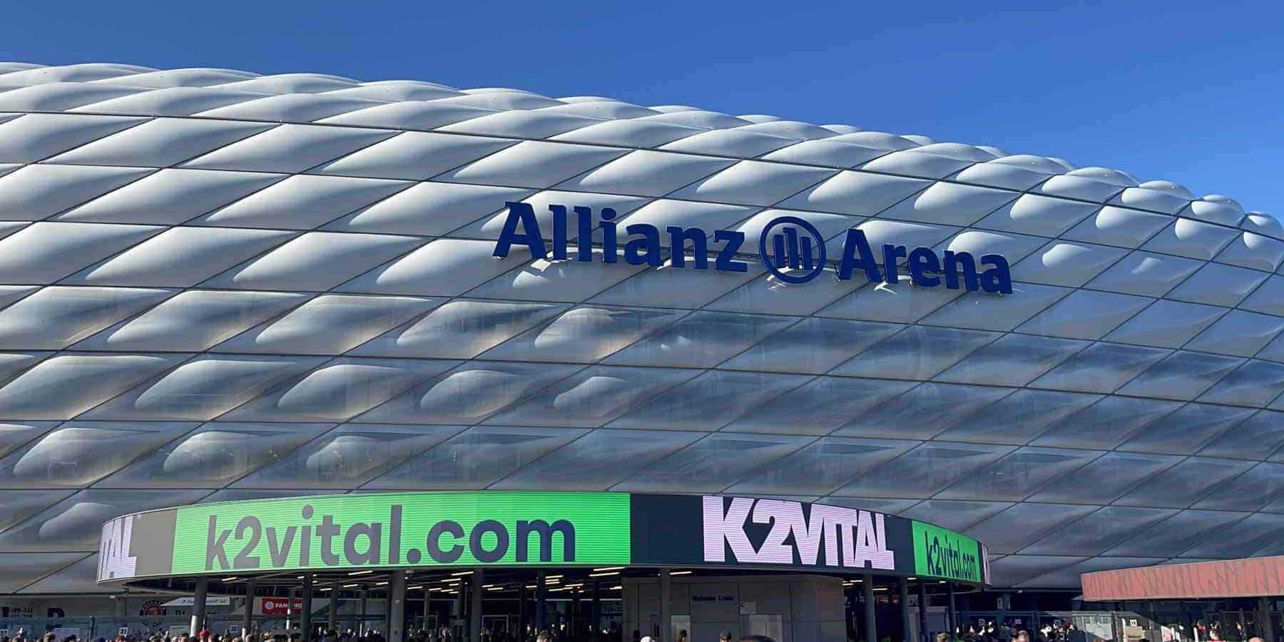 Image of the entrance of Allianz Arena with K2VITAL signage and logo