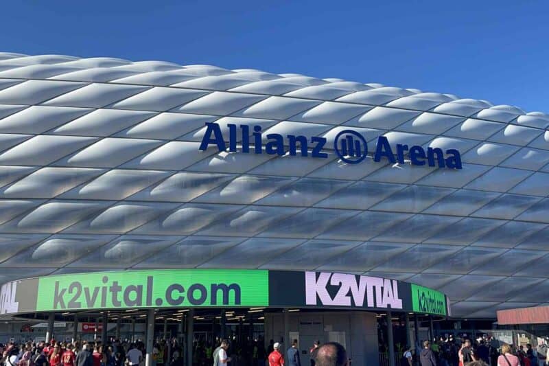 Image of the entrance of Allianz Arena with K2VITAL signage and logo