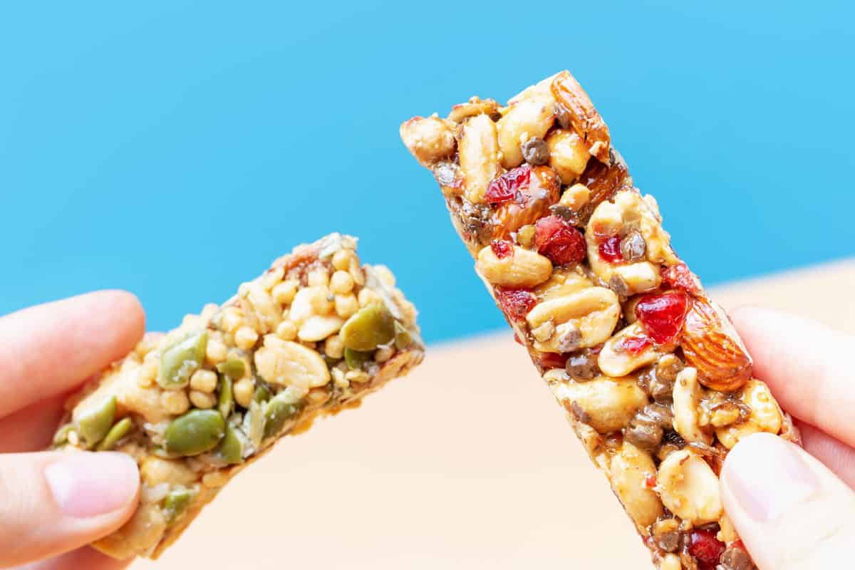 Cereal Solutions Image 1200x800px Image of two cereal bars being held