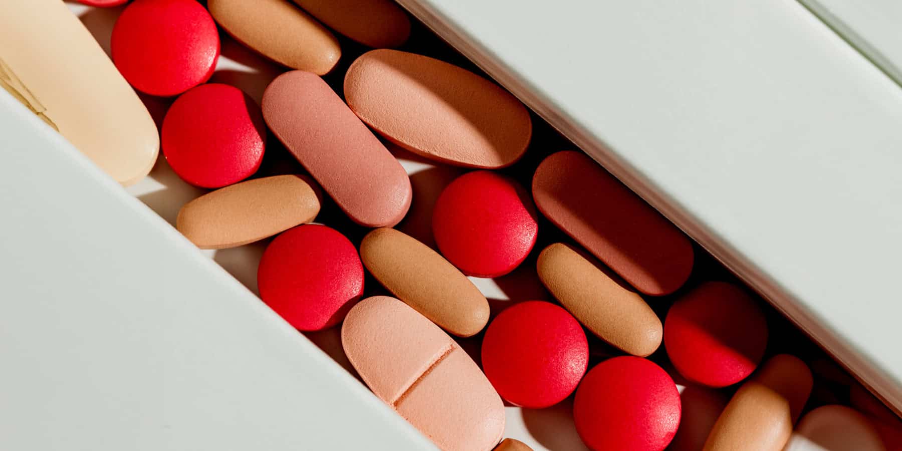 GLP 1 Supplements Hero Image 1800x900px Image of multi-colored pills