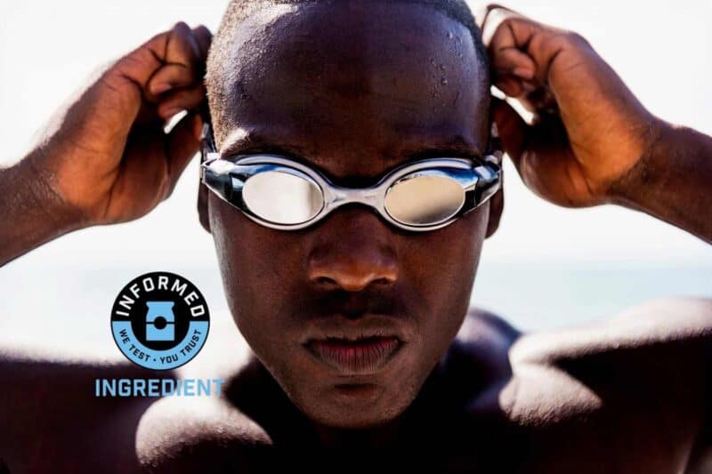 Image of a swimmer with goggles and informed ingredient logo