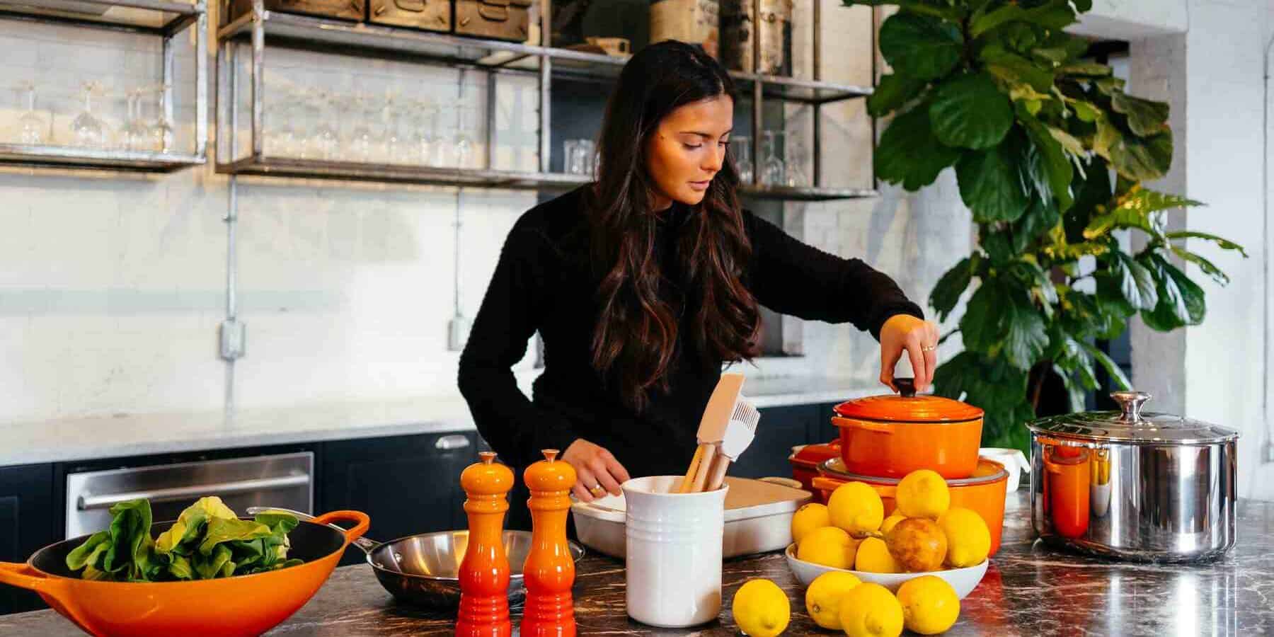 Image of a woman making a salad