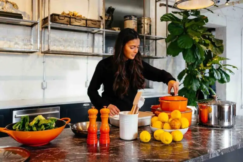 Image of a woman making a salad