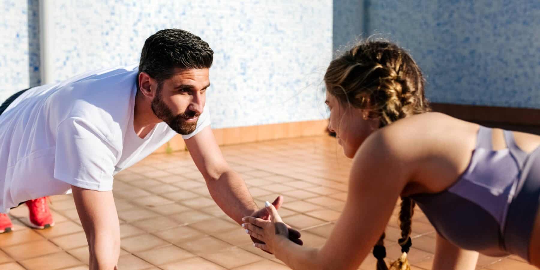 image of a man and woman working out.