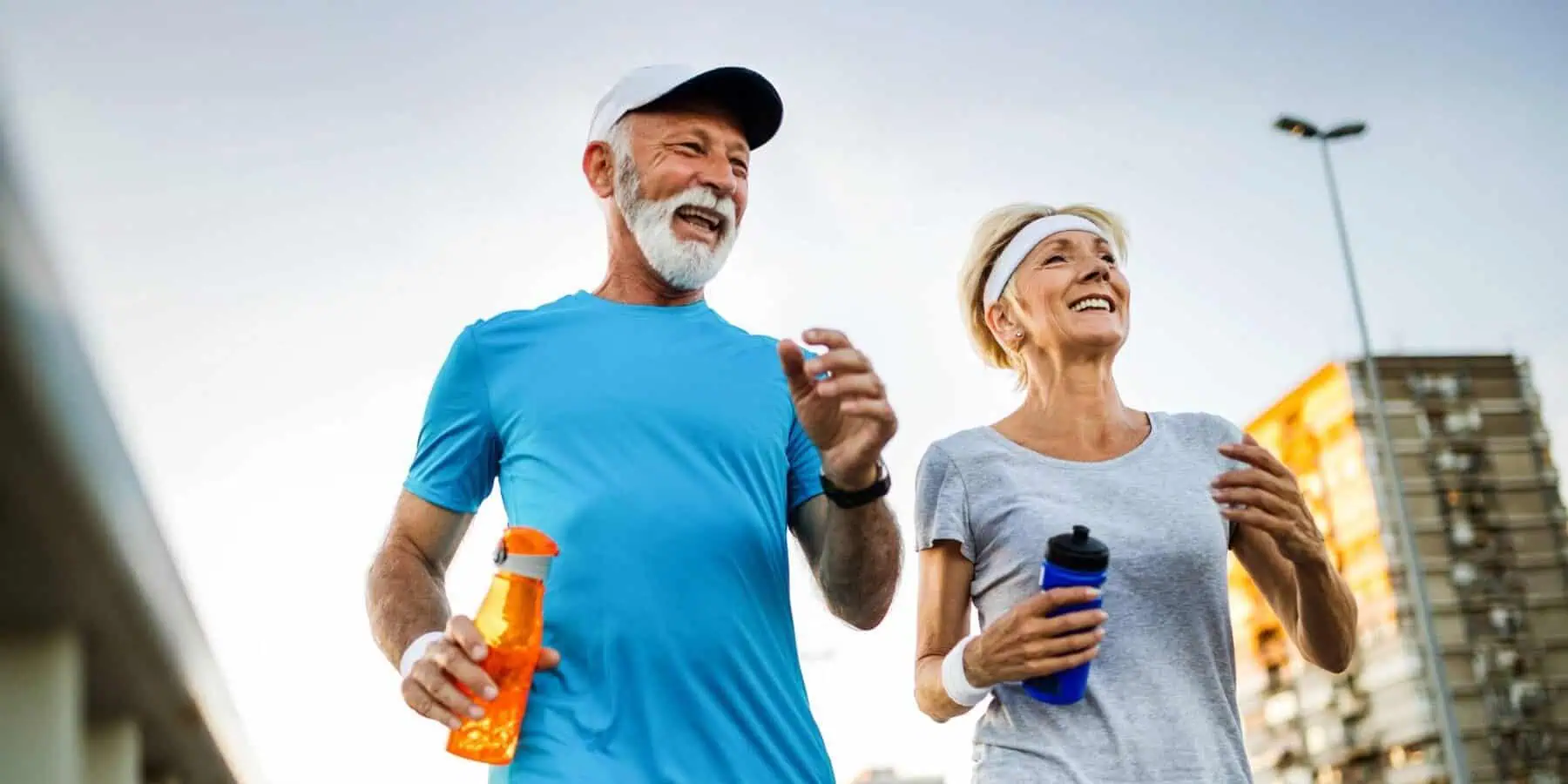 Image of two elderly people walking