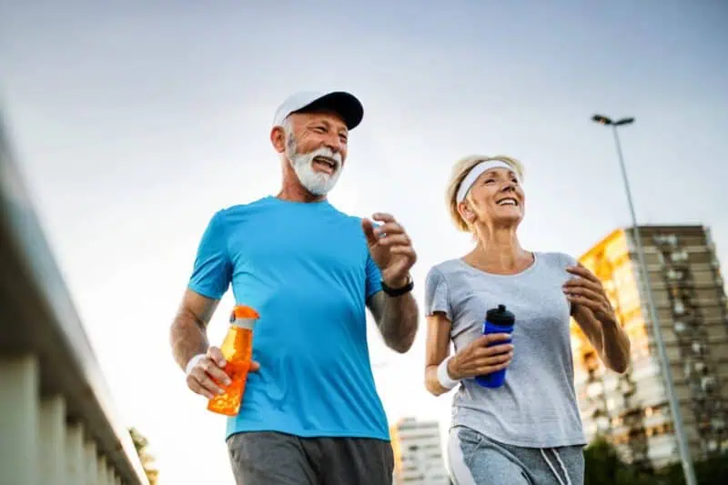 Image of two elderly people walking