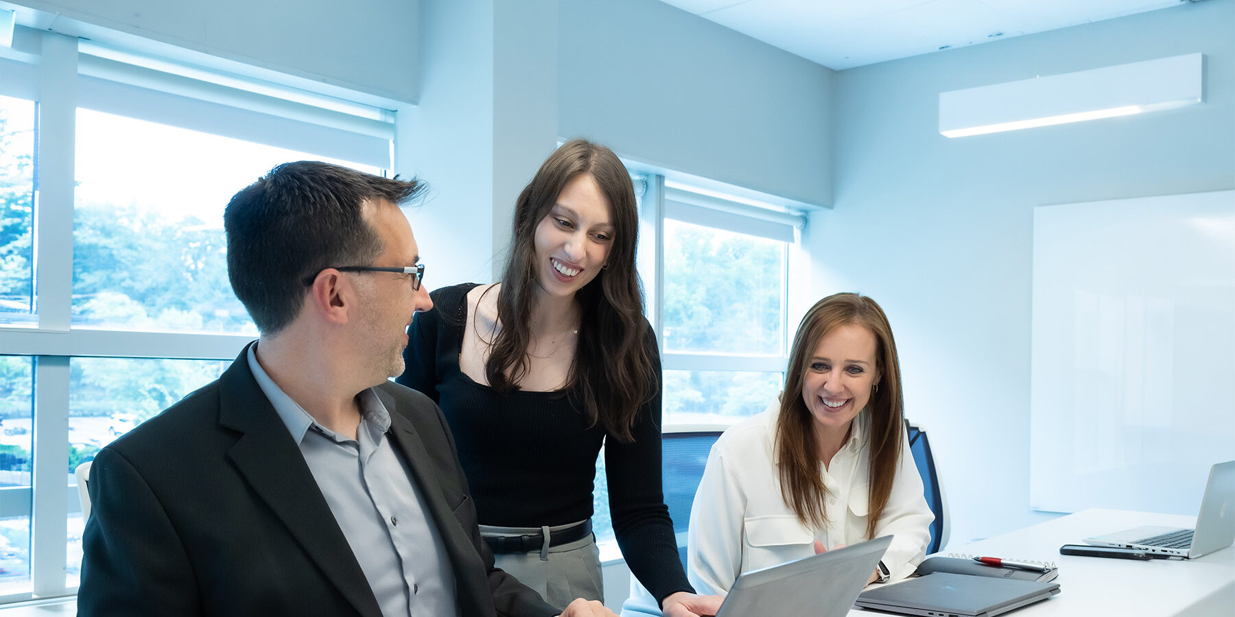 Image of three Balchem employees