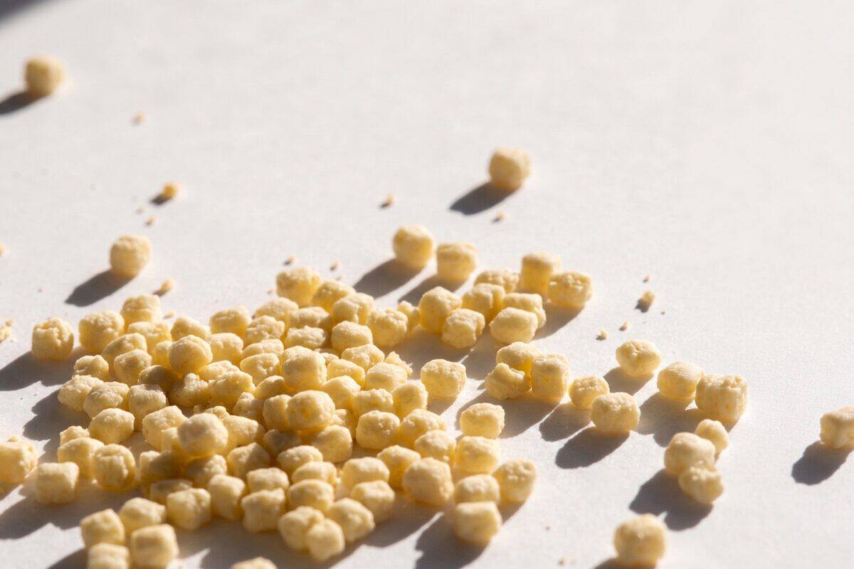 image of multiple milk protein crisps on a white table.