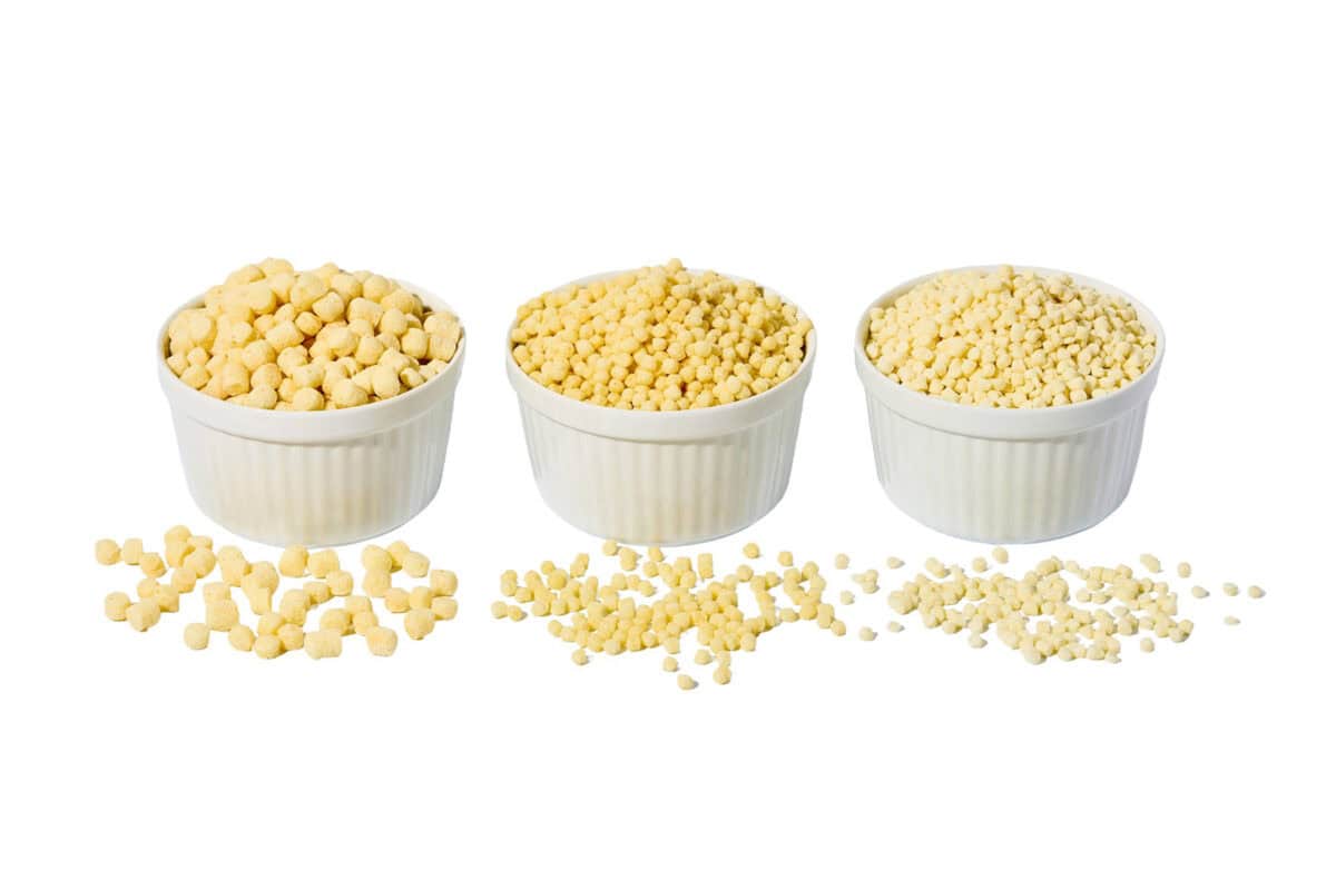 Image of three bowls of different formats of balchem's white, milk-protein crisps.