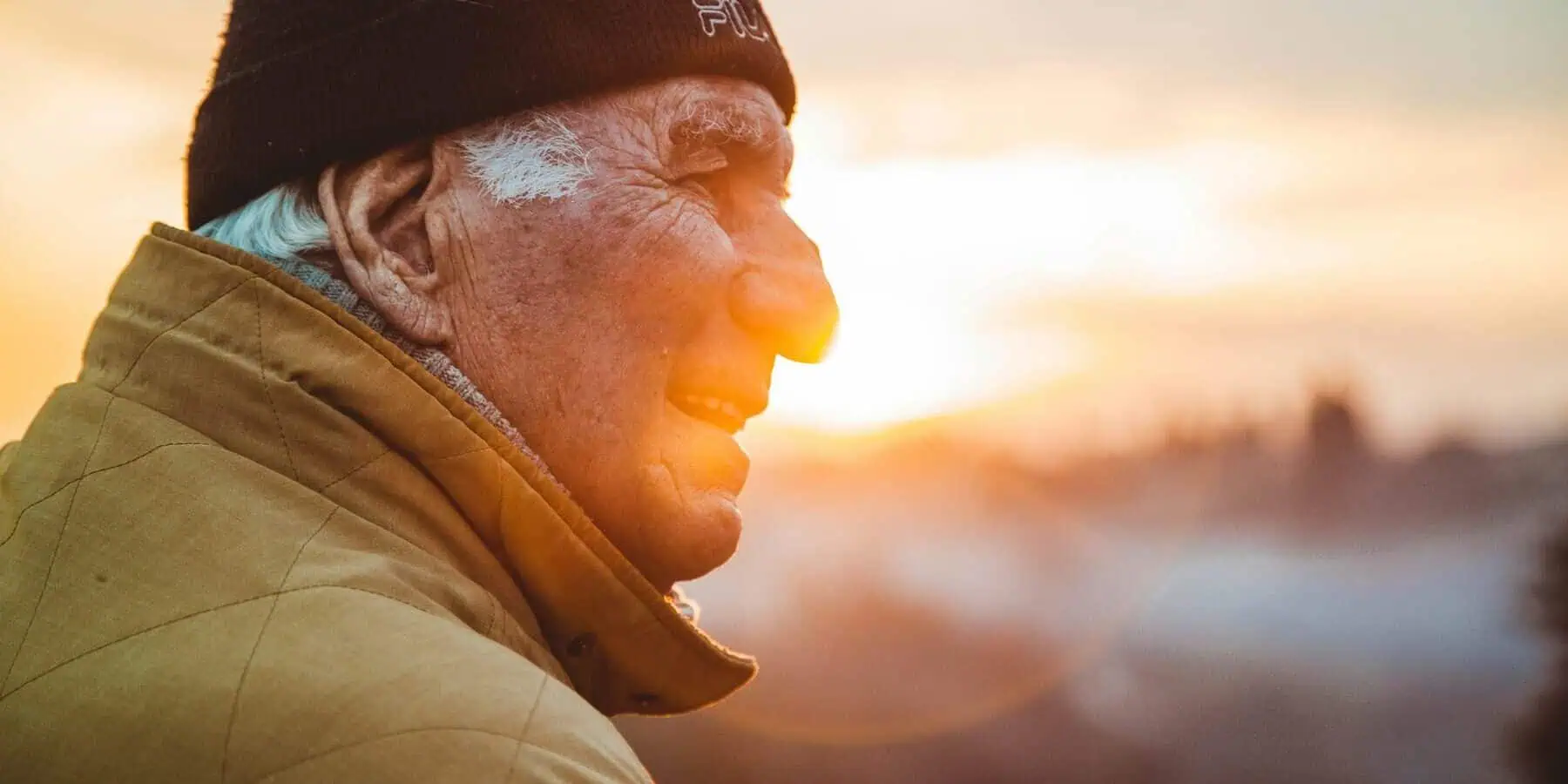 Image of a man looking into the sunset
